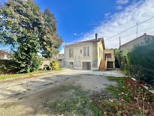 Maison avec jardin et atelier à deux pas des commodités