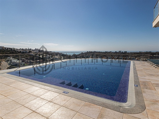 Apartamento de 0+1 dormitorio con piscina, garaje, vistas al mar y puerto deportivo de Albufeira