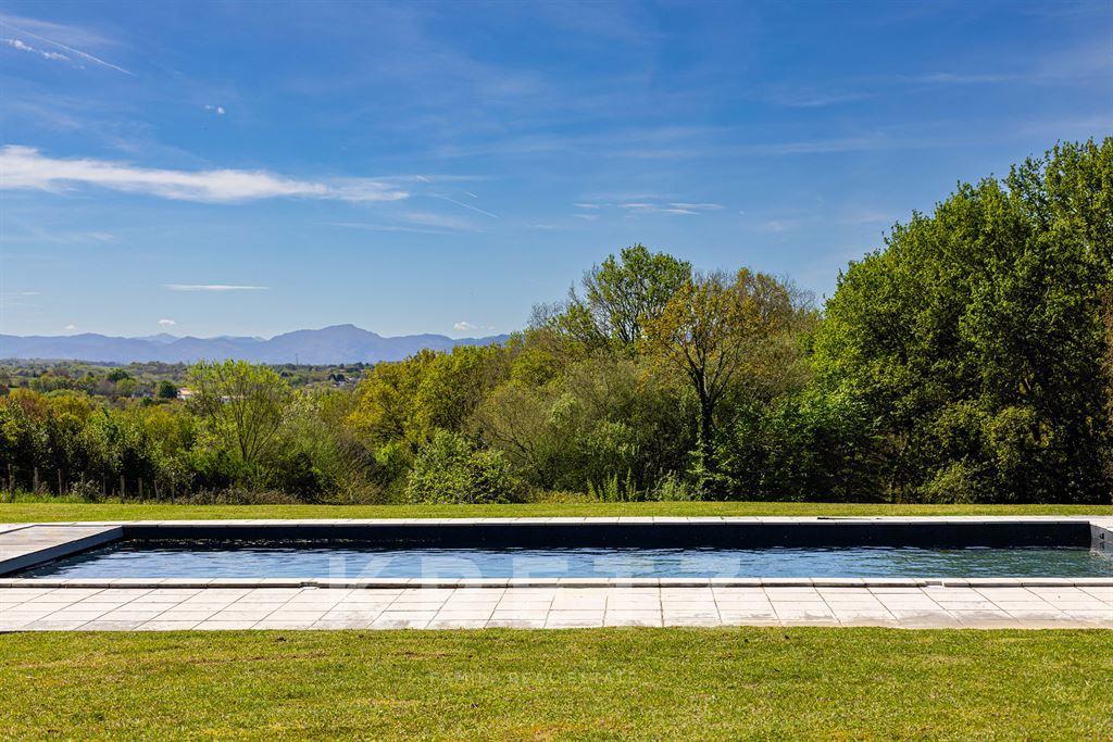 Basque architectural house facing the Pyrenees