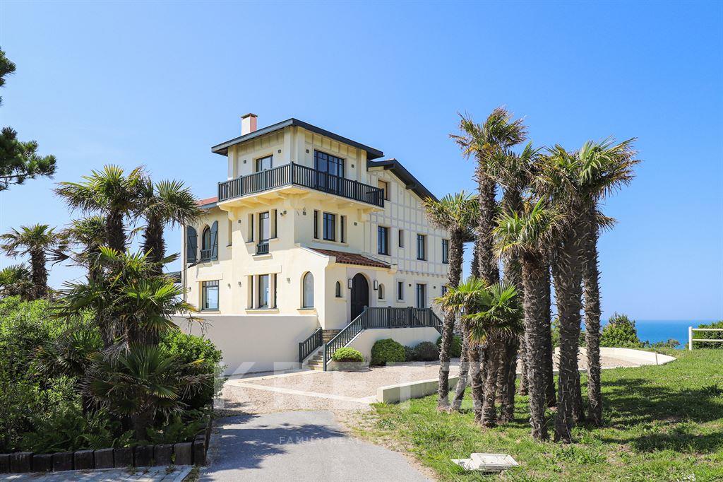 Property on the ocean with panoramic view.
