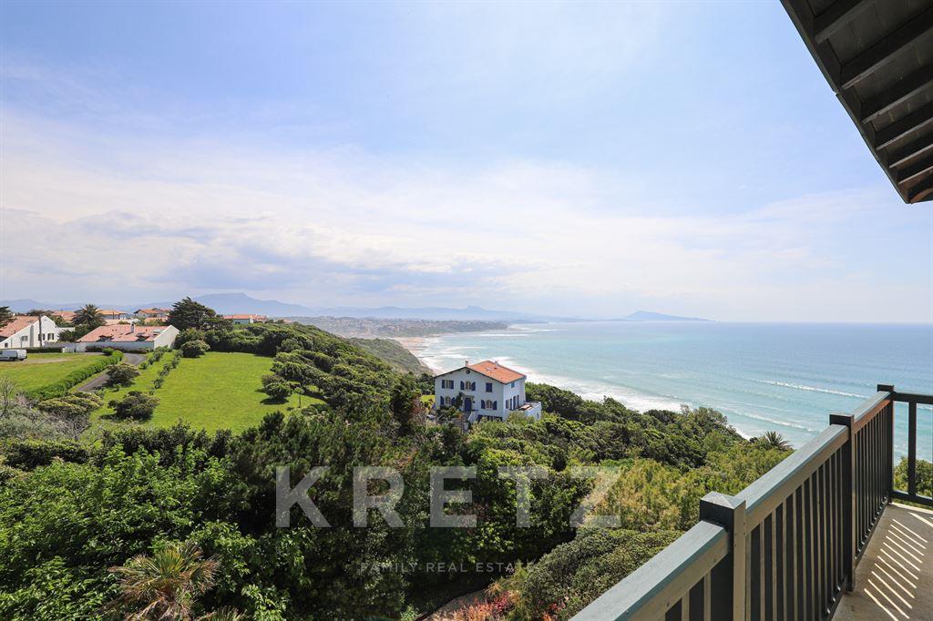 Property on the ocean with panoramic view.