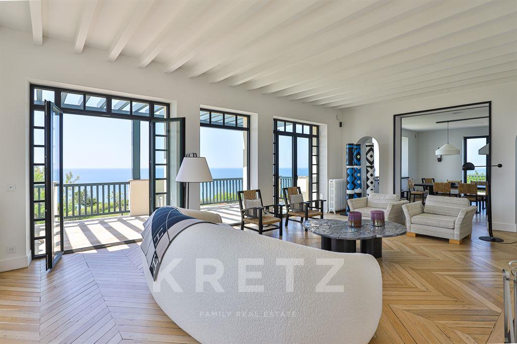 Property on the ocean with panoramic view.