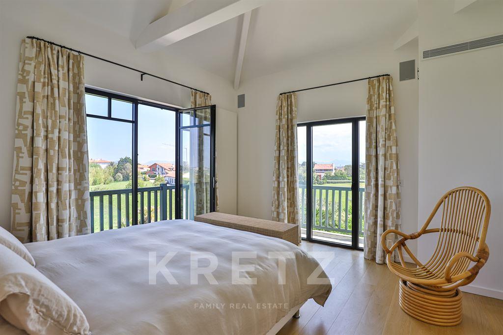 Property on the ocean with panoramic view.