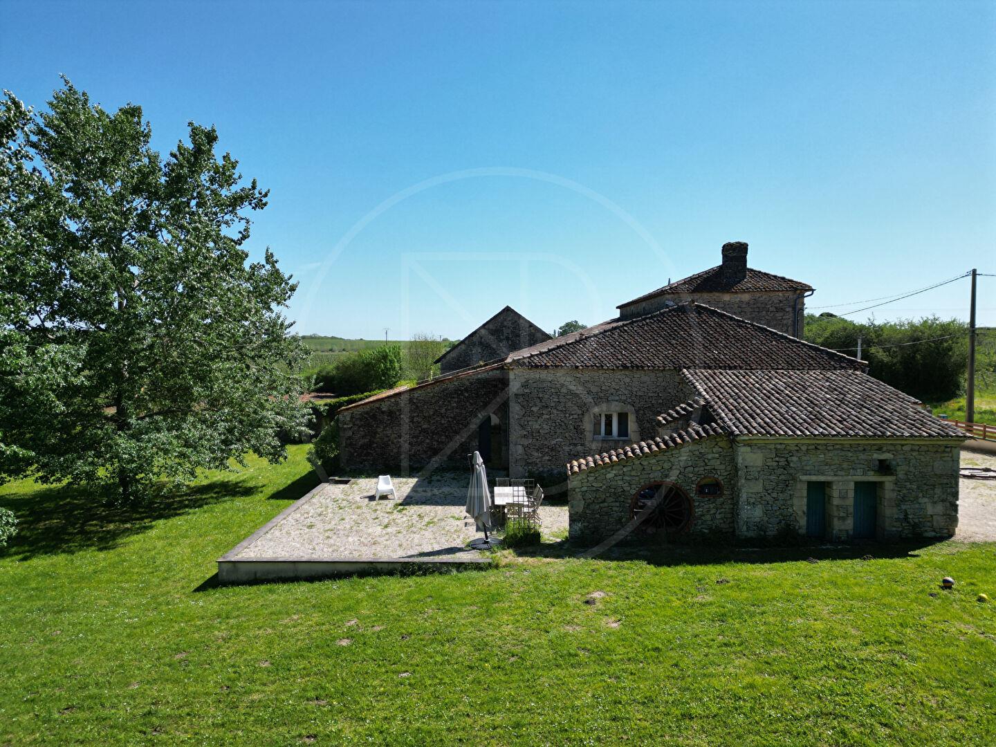 Propriété de charme aux vastes possibilités