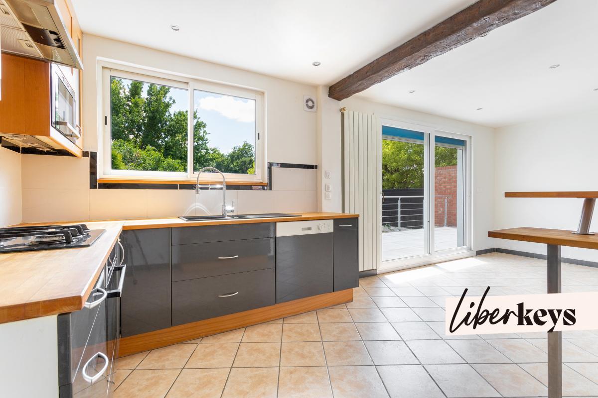 Maison 4 pièces - 2 garages - jardin - 90 m²