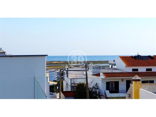 Excellent villas of superior quality, with 3 bedrooms and views of the Ria Formosa.