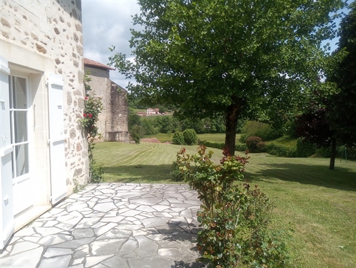 Superb presentation for this Restored Classic village Charente house and barn not far from Chasseneu