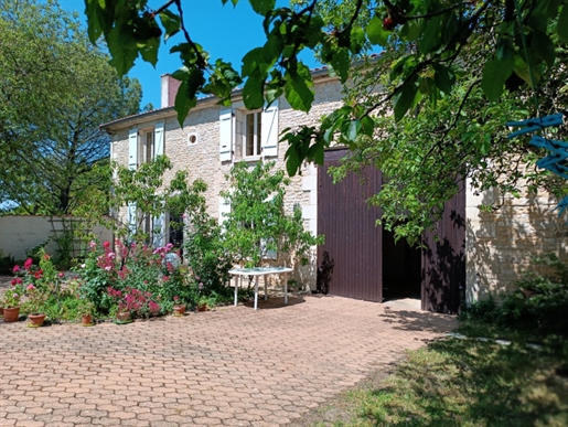 Beautiful Stone House with gite, private driveway, 3 garages and large garden.