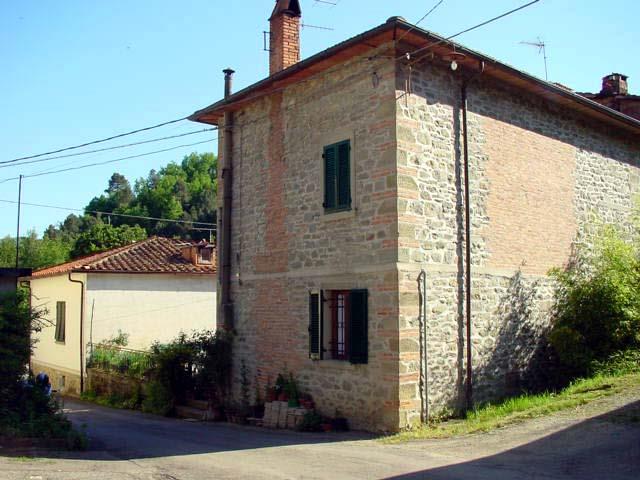 Terraced building with pertinent and garden