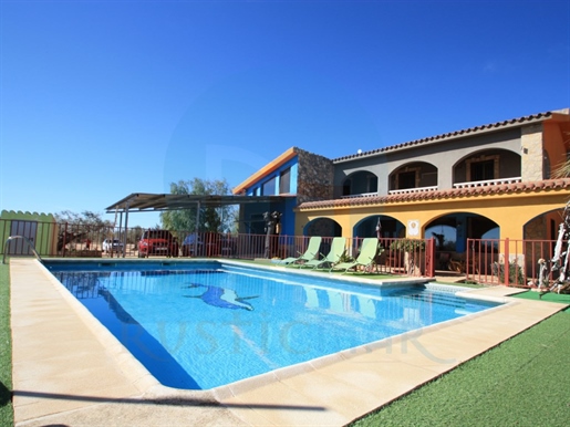 Spectacular rustic property with several houses and swimming pool.
