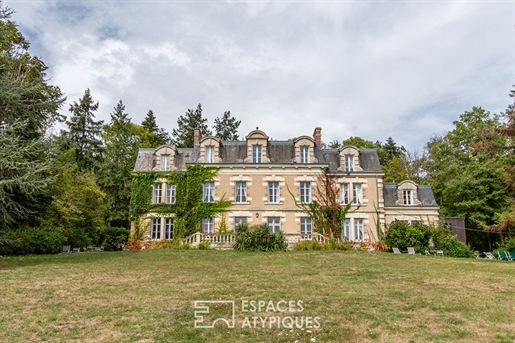 Castle and outbuilding in its magnificent park