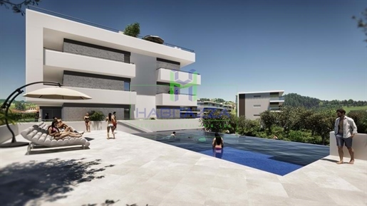Luxe appartement met 3 slaapkamers, zwembad en fitnessruimte, in een rustige wijk van Portimão