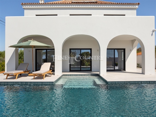 Tavira, new villa with traditional architecture featuring 3 bedroom, pool, and landscaped garden.