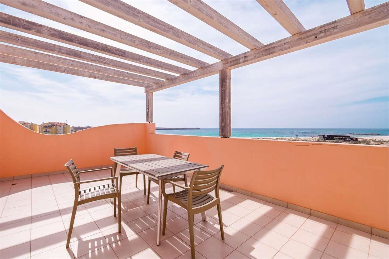 Seafront penthouse with large terrace