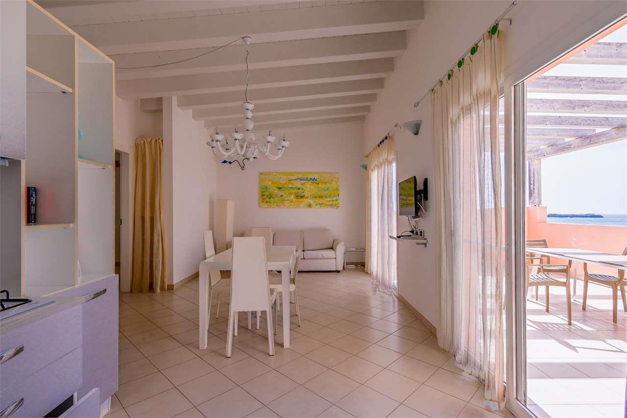 Seafront penthouse with large terrace