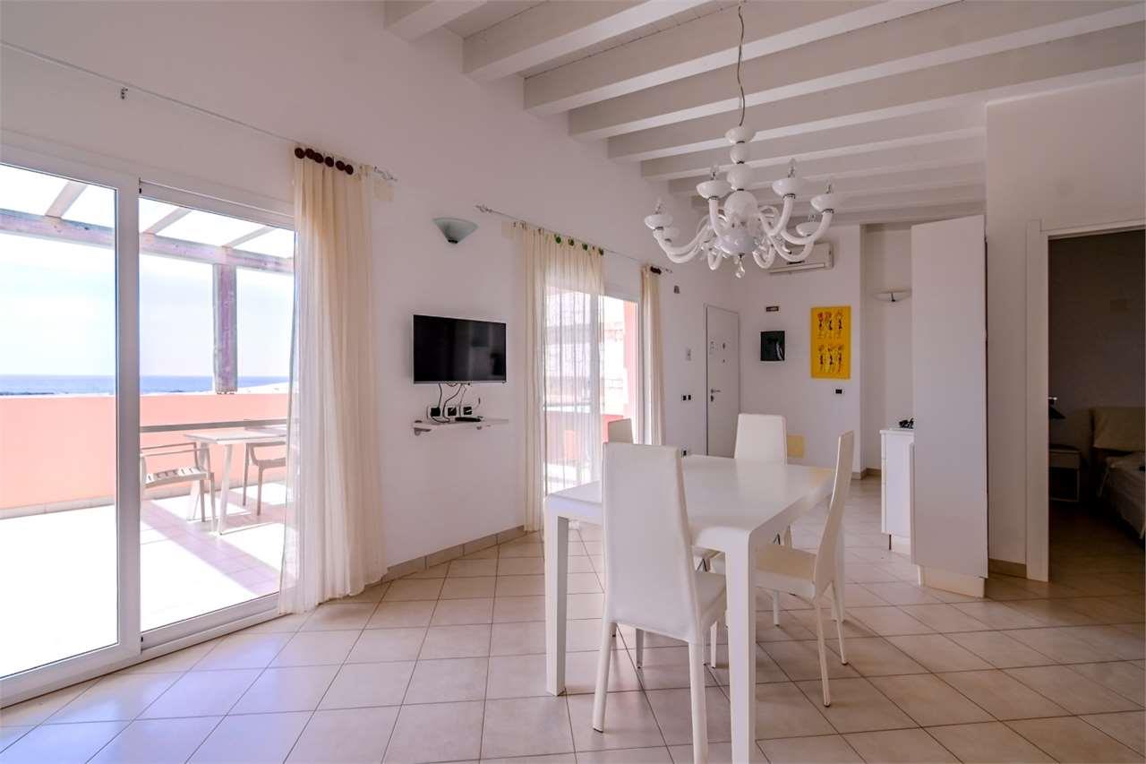 Seafront penthouse with large terrace