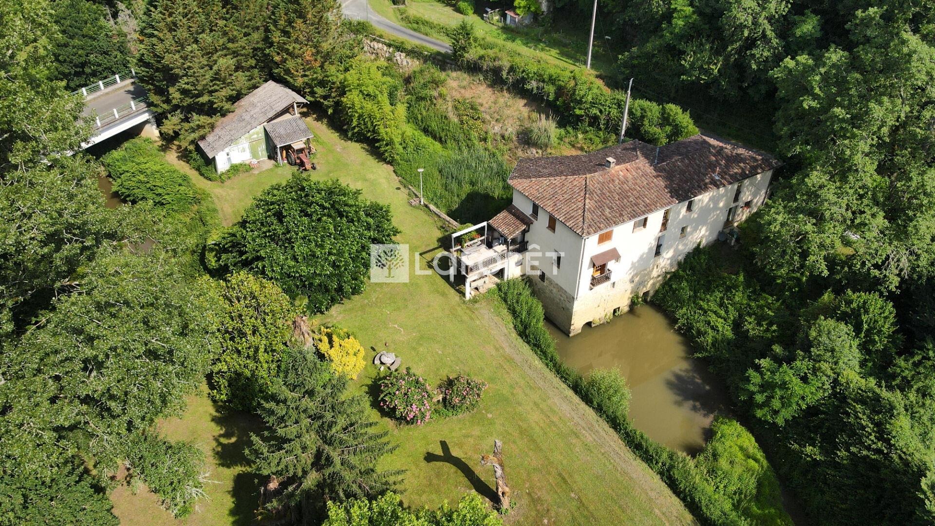 Moulin, a haven of peace between stones and river
