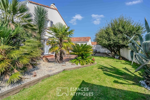 Family villa surrounded by a landscaped garden with swimming pool