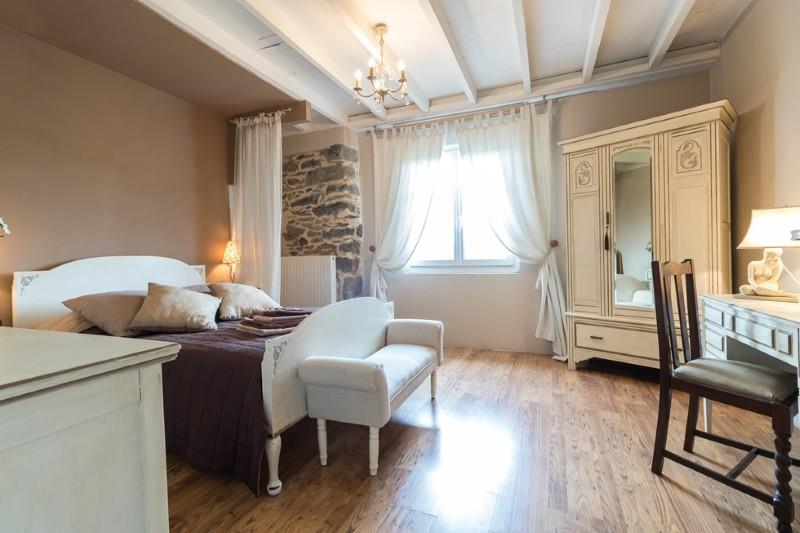 Old house completely renovated into guest rooms