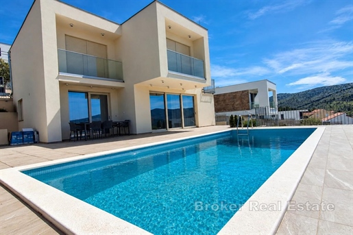 Luxury villa with modern design and swimming pool and panoramic sea views