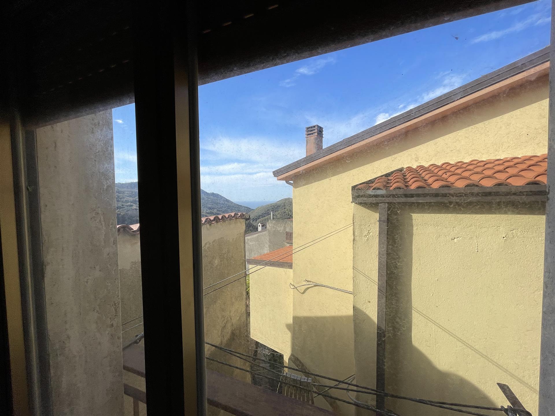 A Hidden Gem in the Heart of the Village – Character, Privacy, and Potential