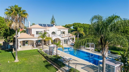 Luxurious Six-Bedroom Villa on Sprawling Estate with Pool, Tennis Court, and Chalet.