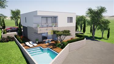 Modern villa in a quiet location, 400 m from the sea and 1000 m from the city center.