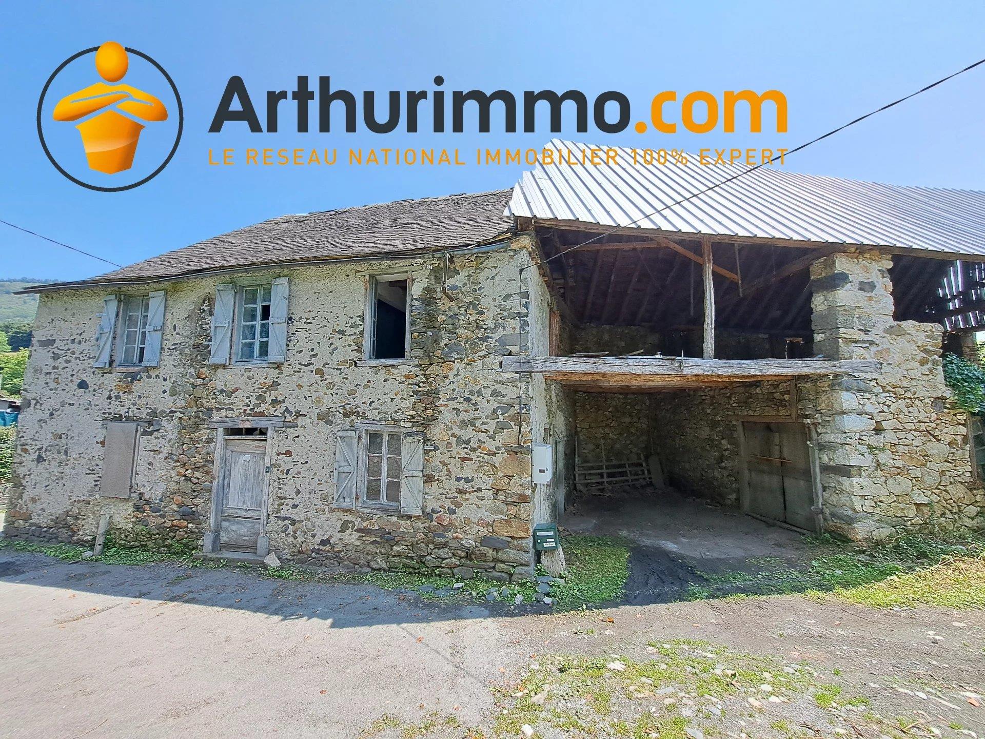 Stone house to renovate with 2 barns.