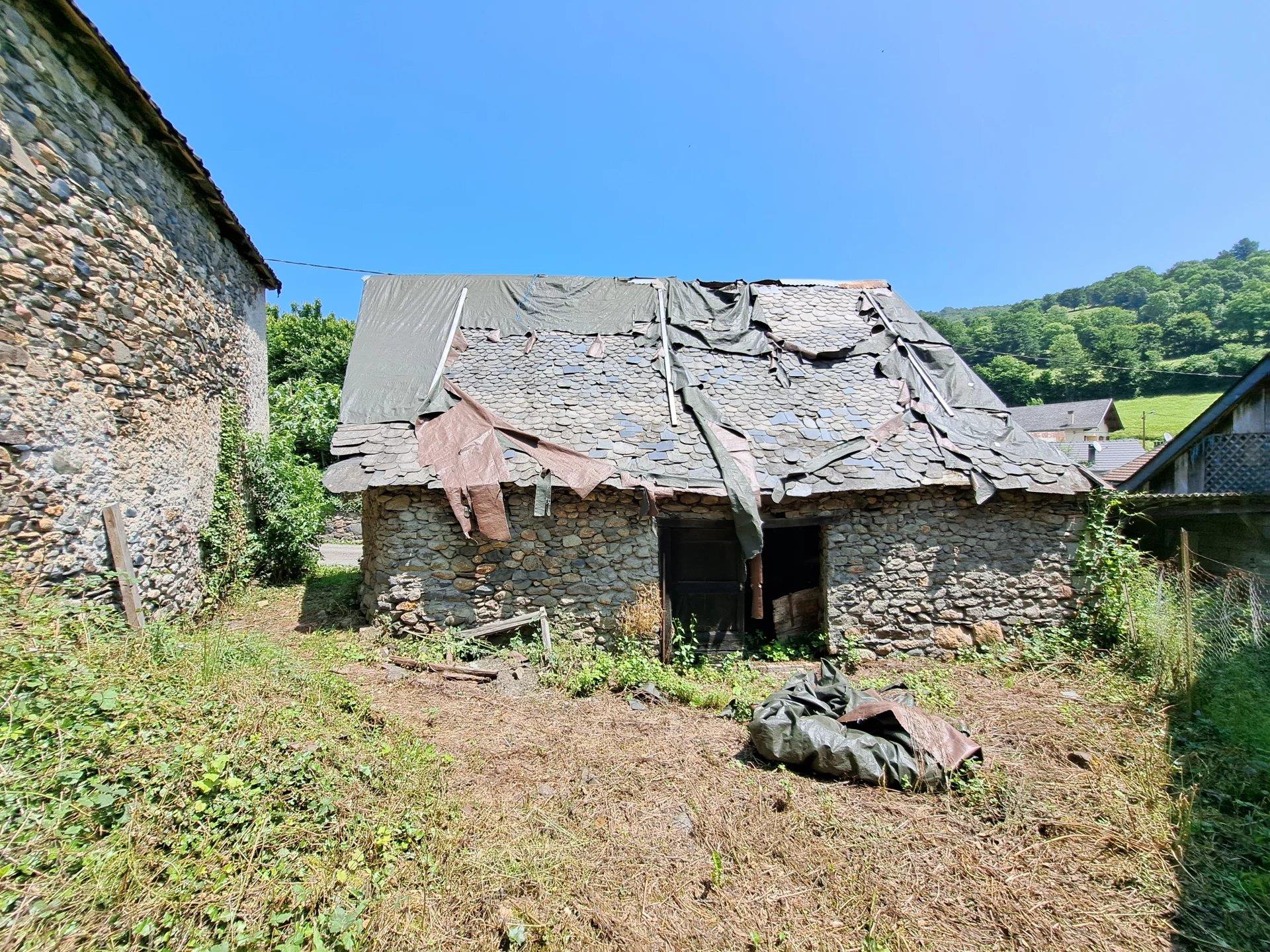 Stone house to renovate with 2 barns.