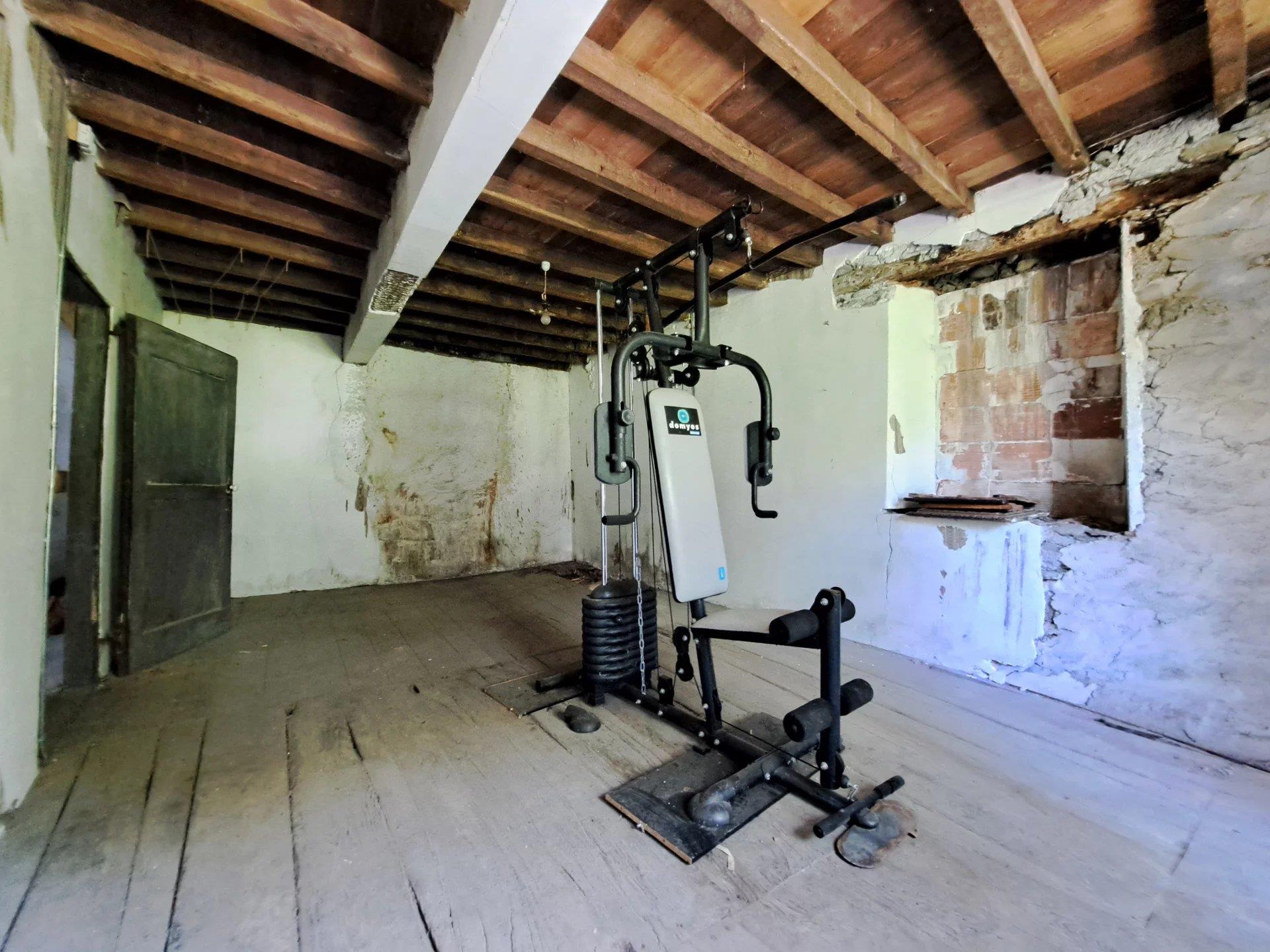 Stone house to renovate with 2 barns.