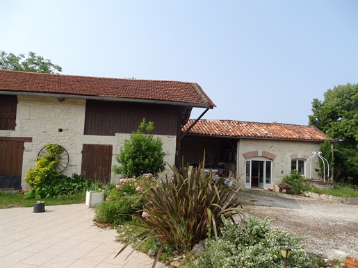 Beautiful and spacious stone house with swimming pool and outbuildings