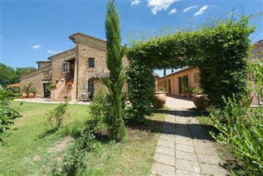 For sale outstanding stone house with pool in the heart of Tuscany. 