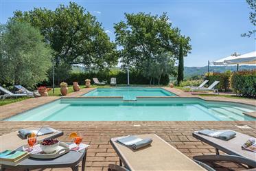 For sale outstanding stone house with pool in the heart of Tuscany. 