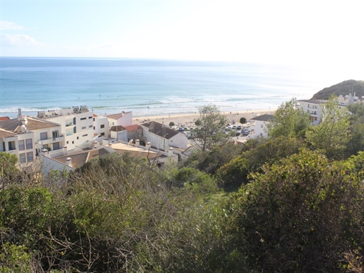 Urban land, seafront, with a project for the construction of 23 dwellings, in Praia da Samela, Algar