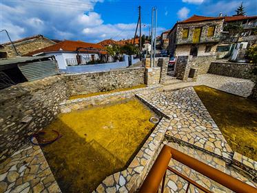 Całkowicie odnowiony kamienny dom w Andriani - Agios Andreas
