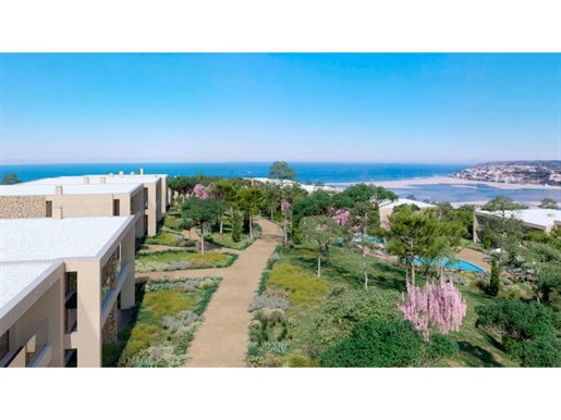 Moradia T3 geminada com jardim e piscina com e vista de Mar em Golf Resort 5 , perto de Óbidos.
