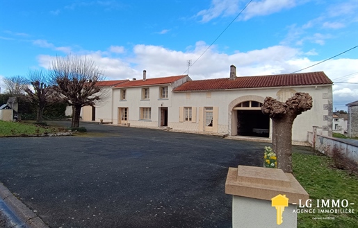 Stone house of 212 m2, 5 bedrooms and large outbuildings on land of 1047 m2.