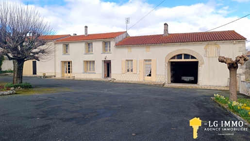 Stone house of 212 m2, 5 bedrooms and large outbuildings on land of 1047 m2.