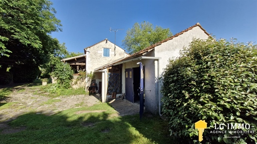 Maison de plain-pied, 3 ch, garages, terrain de 5 595 m2