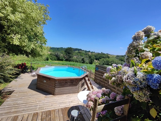 Maison de campagne avec dépendance, piscine et terrain d'environ 2670m²