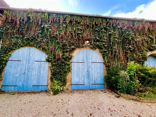 Beautiful renovated farmhouse with attached barns and stunning gardens
