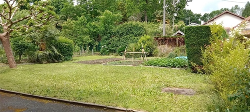 Maison de ville dans quartier résidentiel calme avec jardin