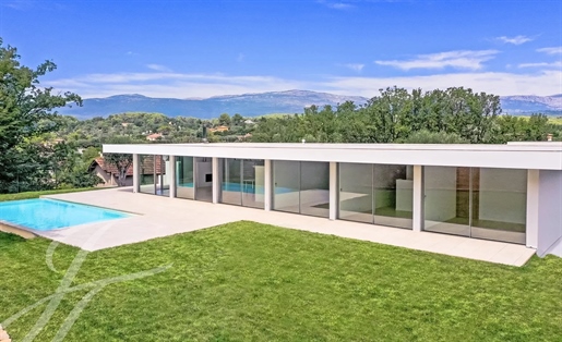 Remarkable architect-designed villa within walking distance of the village