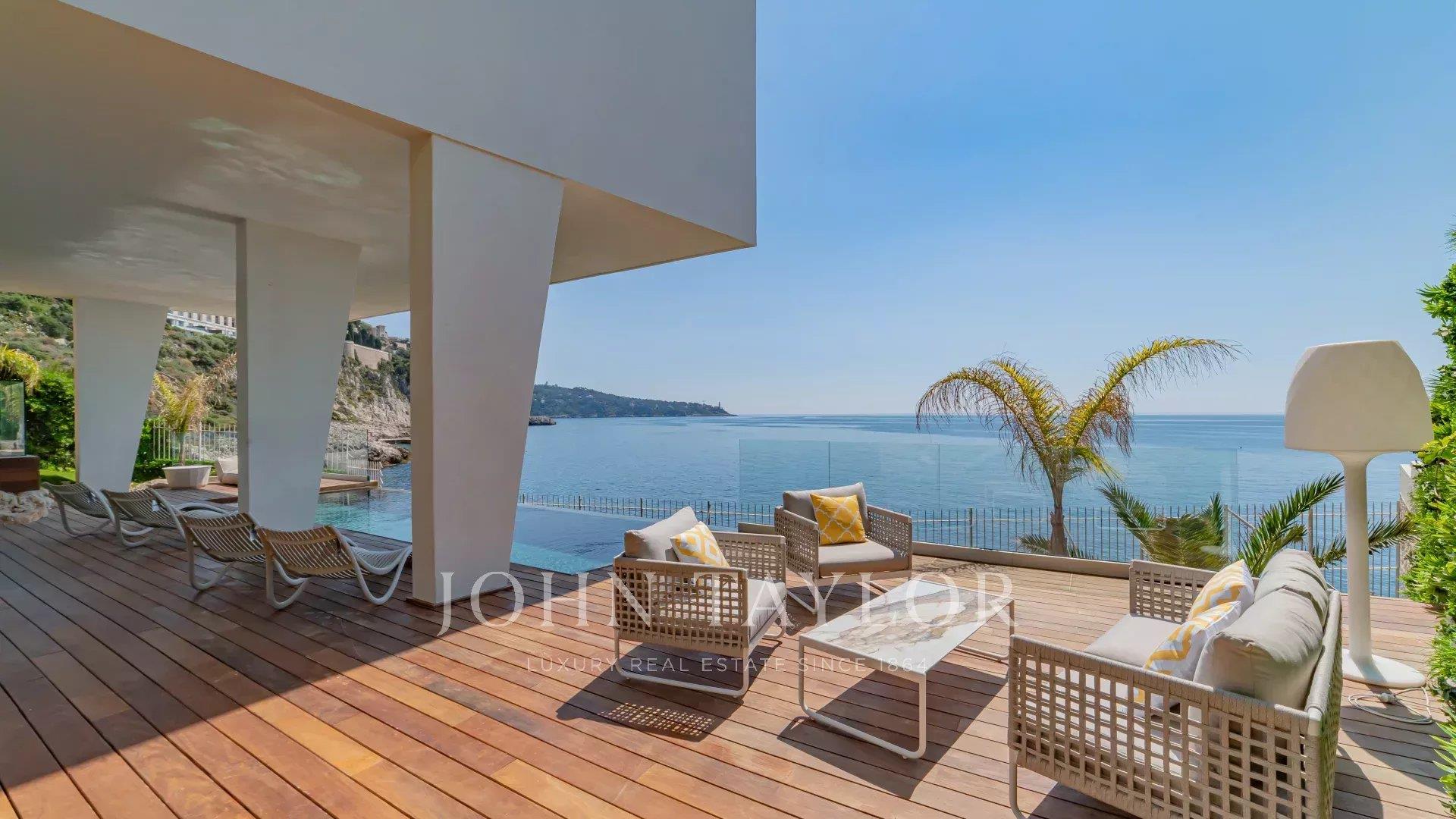 Contemporary Waterfront Villa with Panoramic Sea View
