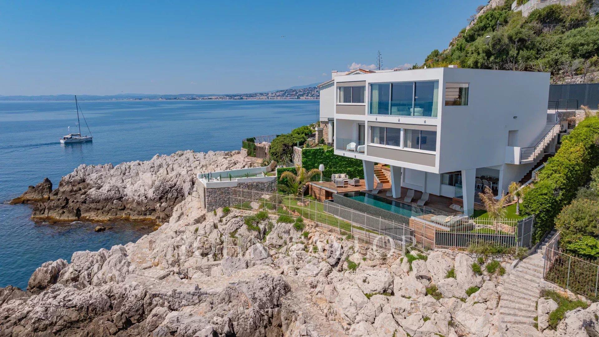 Contemporary Waterfront Villa with Panoramic Sea View