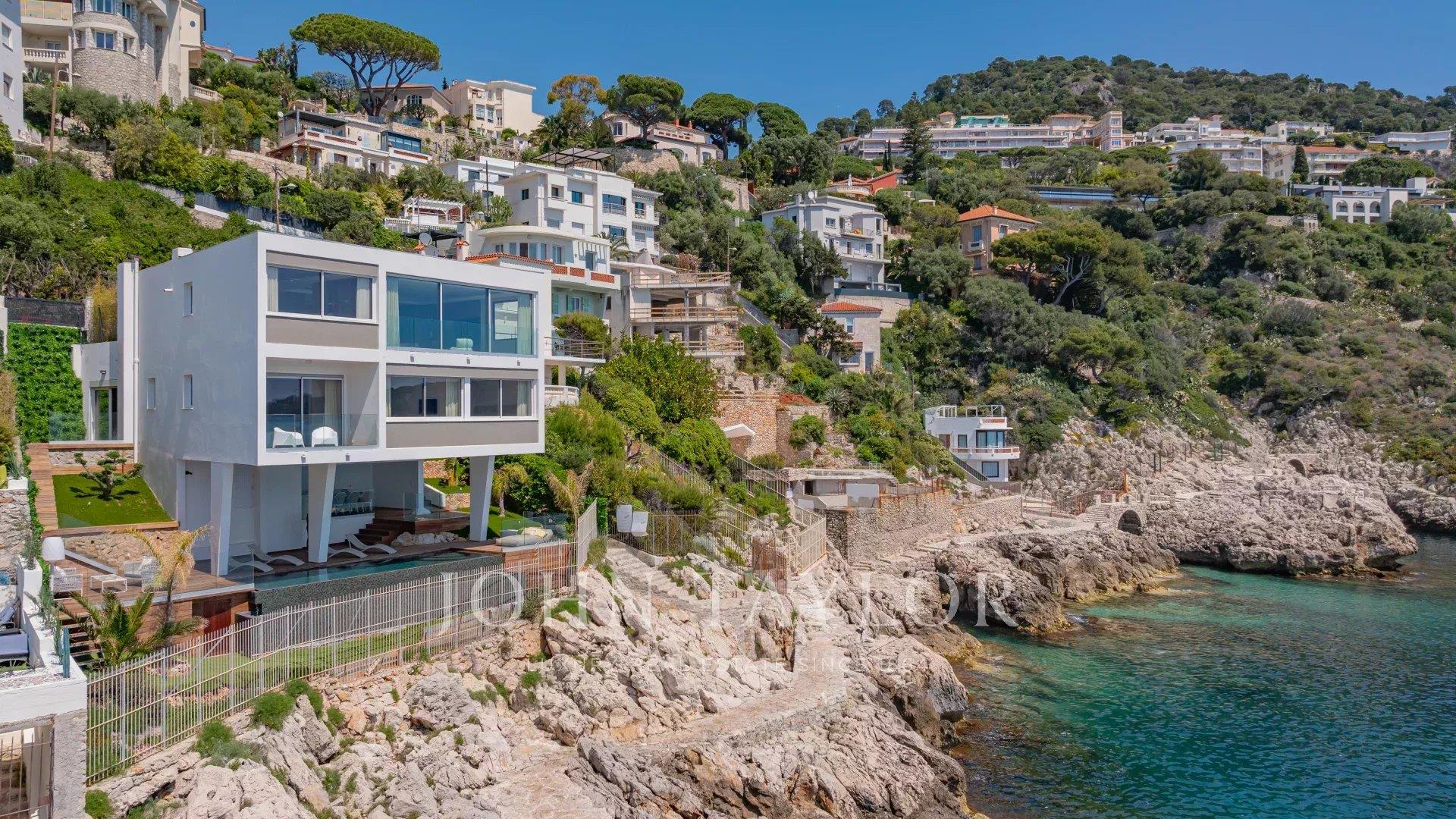 Contemporary Waterfront Villa with Panoramic Sea View