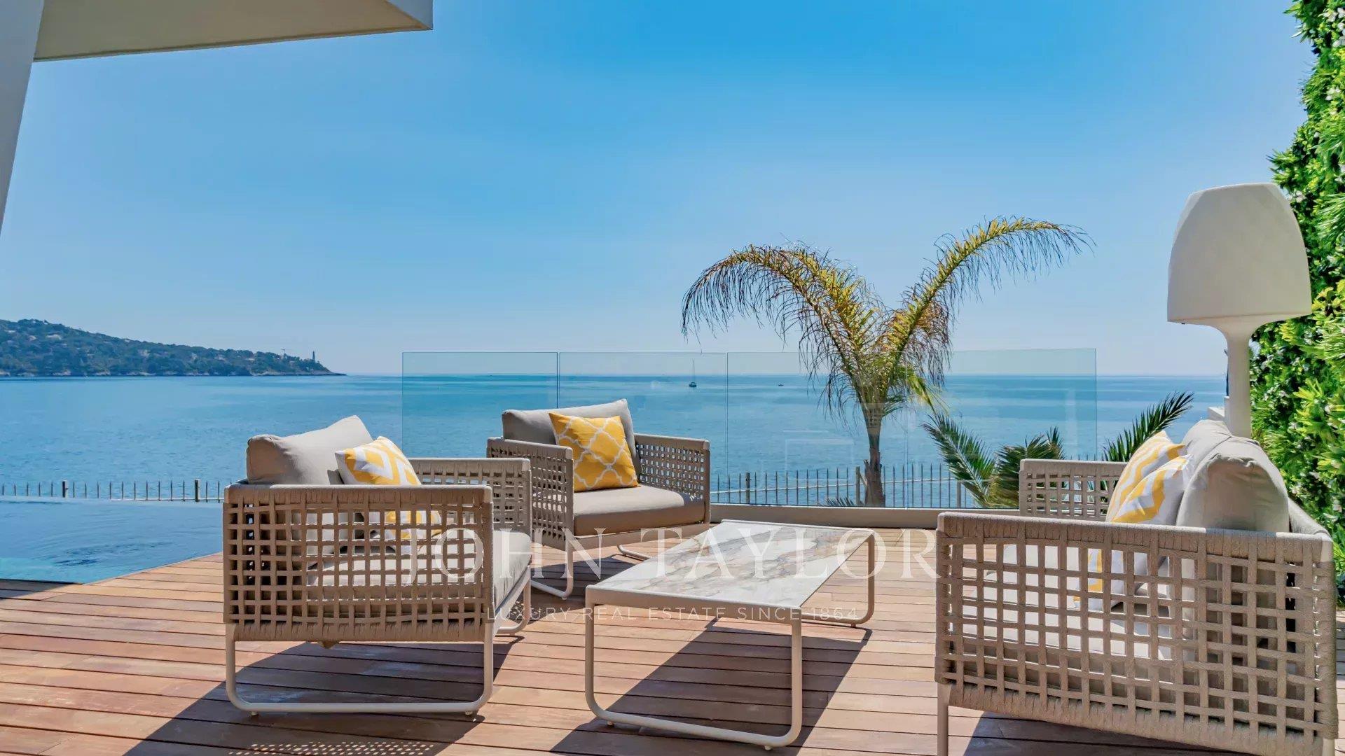 Contemporary Waterfront Villa with Panoramic Sea View