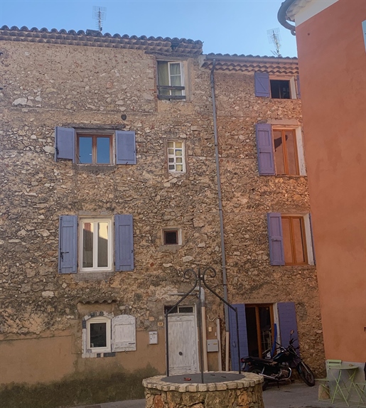 Building to renovate in the centre of the village