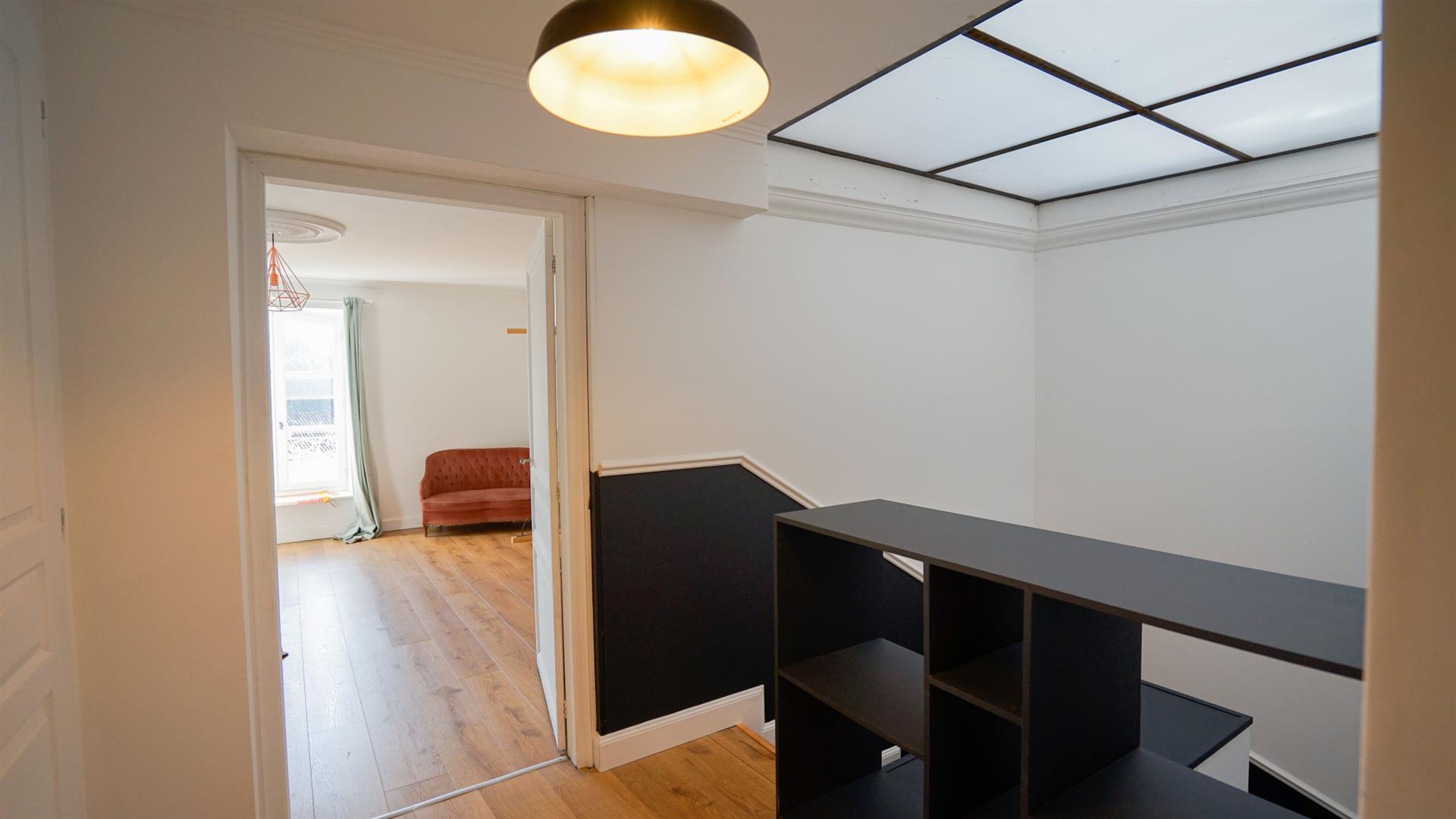 Character house with apartment, garages and large terrace in the historic heart of Montcuq