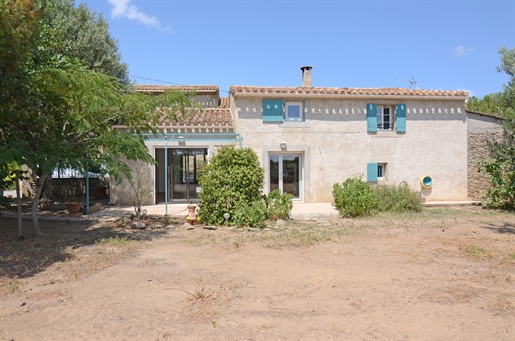 Stone property with garden, well, garage, barn and park close to Caunes Minervois